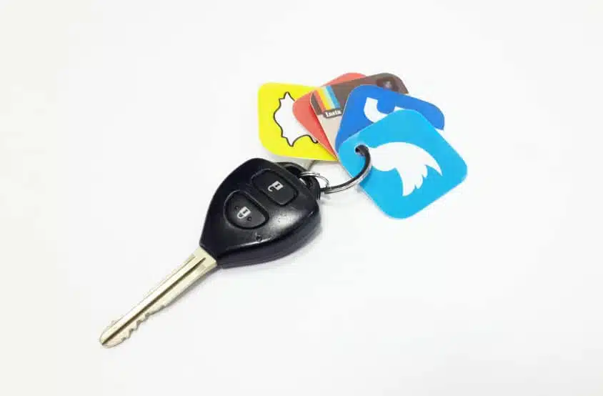 A key with social media icons key holder.