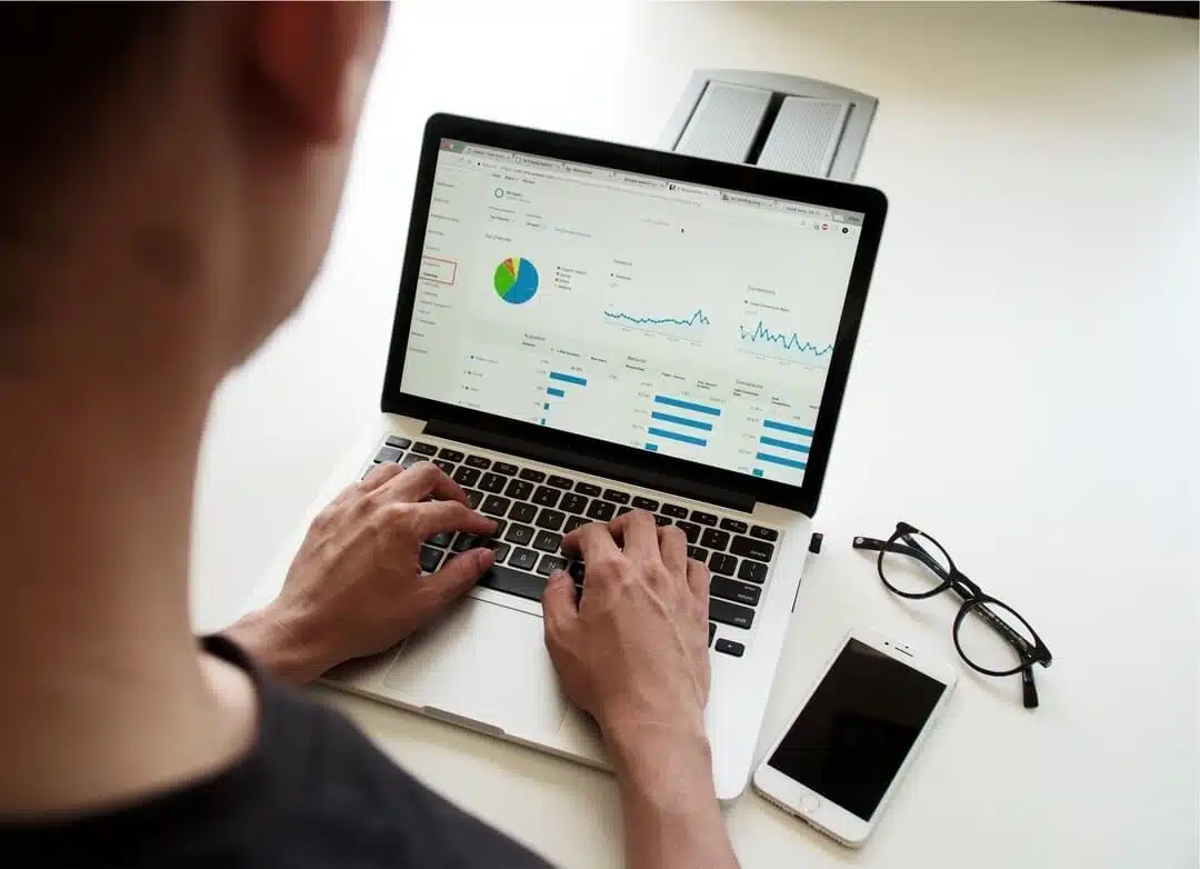 man on a laptop with metrics shown - inbound marketing