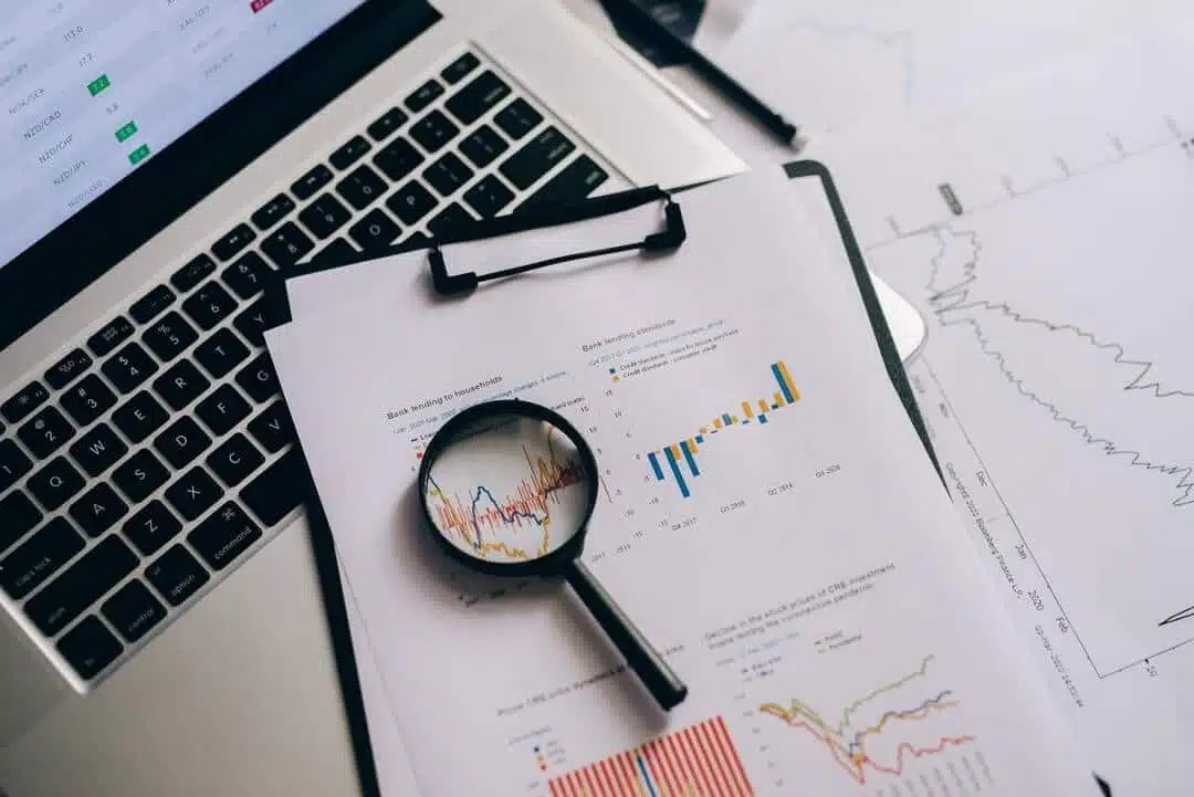 records showing the inbound marketing data report under magnifying glass