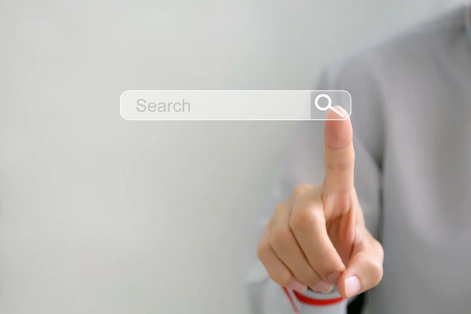 An image of a hand pointing out the search bar for keyword search concept