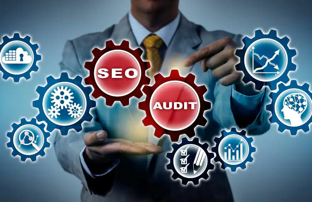 Man showing a SEO Audit word concept.