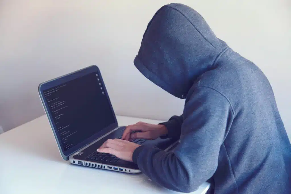 Man doing some hacking and other internet threats