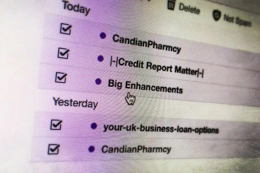 spam emails on computer screen
