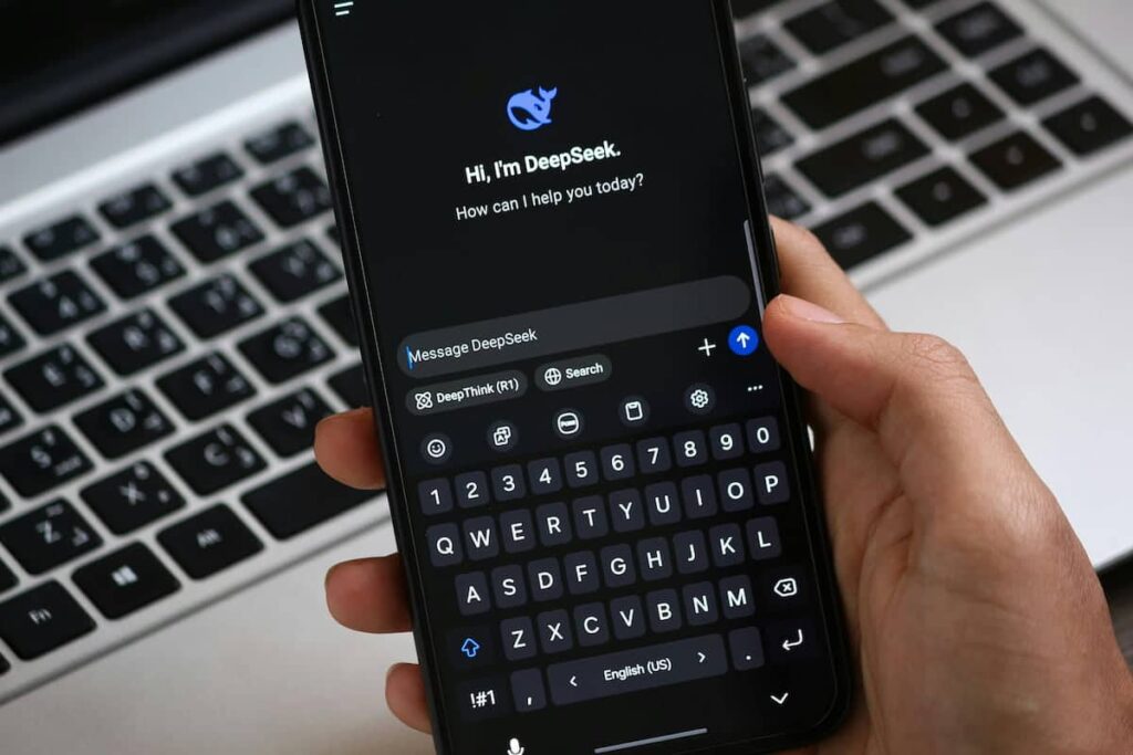 Person Holding Smartphone with AI Chat Interface