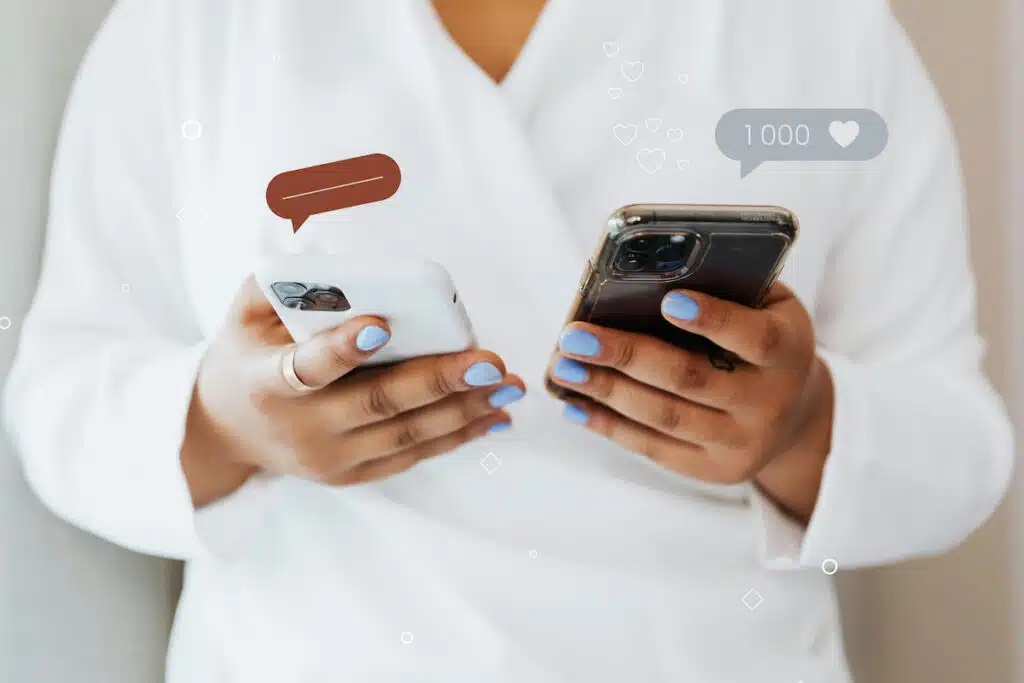 Person Holding Smartphones
