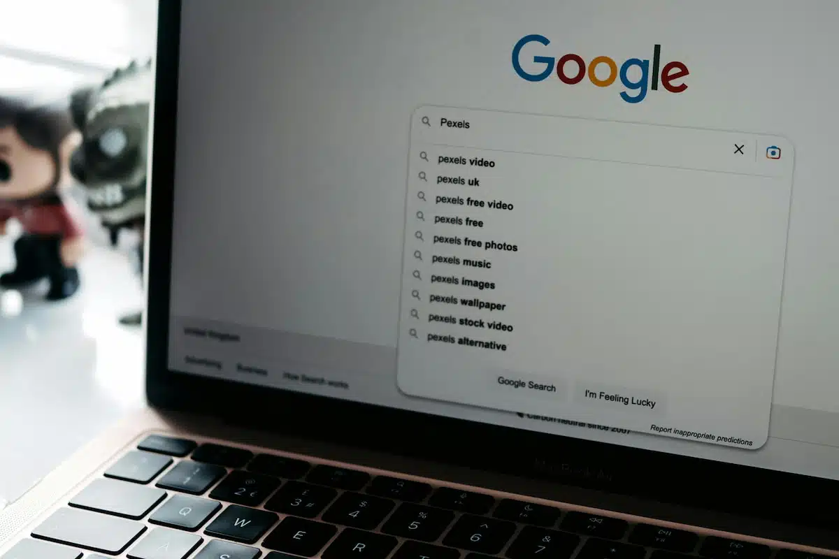 Photo of a Laptop Screen with Google Main Page on It